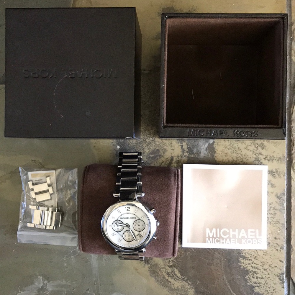 Michael Kors Watch with a pearl face & diamonds